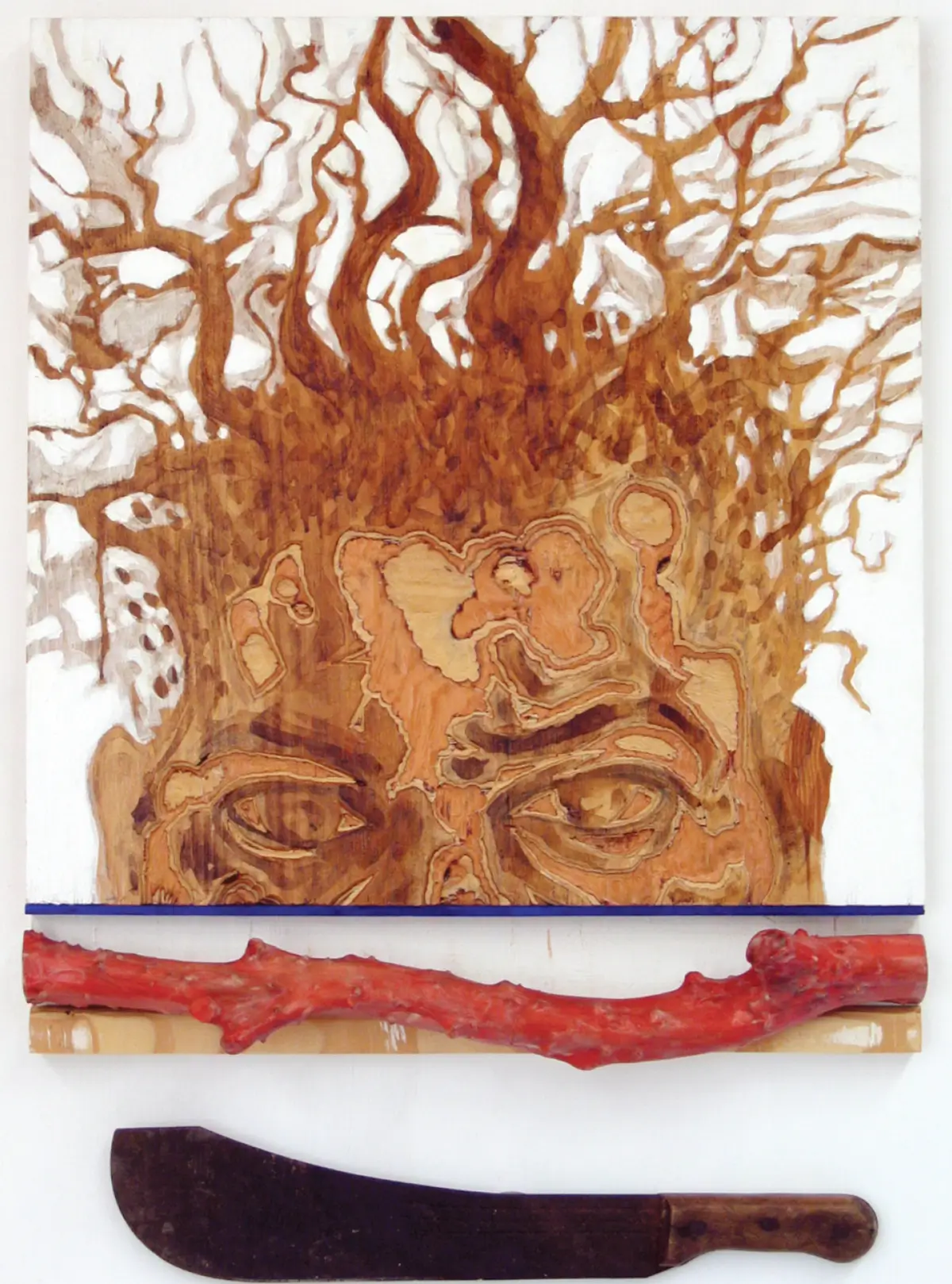 Mixed-media face with branching, tree-like forms rising upward, with layered horizontal bars and a machete-like blade placed beneath.